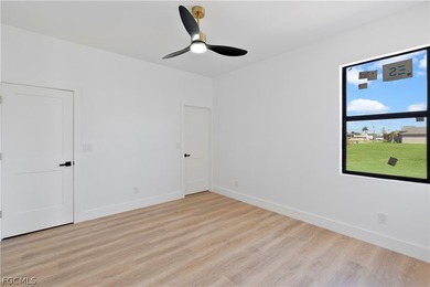 Exclusive new construction waterfront residence that redefines on Burnt Store Golf Club in Florida - for sale on GolfHomes.com, golf home, golf lot