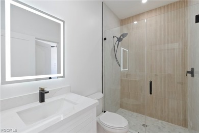 Exclusive new construction waterfront residence that redefines on Burnt Store Golf Club in Florida - for sale on GolfHomes.com, golf home, golf lot