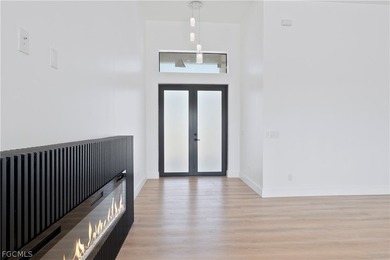 Exclusive new construction waterfront residence that redefines on Burnt Store Golf Club in Florida - for sale on GolfHomes.com, golf home, golf lot