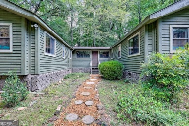 Looking for an affordable getaway? Check out this unique on Mountain Harbour Golf Club in North Carolina - for sale on GolfHomes.com, golf home, golf lot