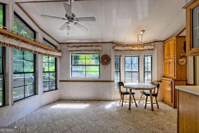 Looking for an affordable getaway? Check out this unique on Mountain Harbour Golf Club in North Carolina - for sale on GolfHomes.com, golf home, golf lot