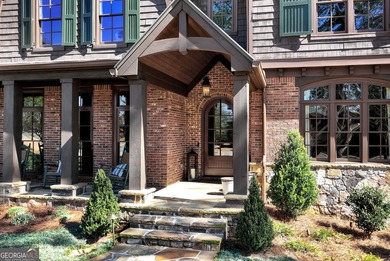 Nestled on a private .88-acre wooded lot in the prestigious on The River Club in Georgia - for sale on GolfHomes.com, golf home, golf lot