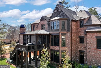 Nestled on a private .88-acre wooded lot in the prestigious on The River Club in Georgia - for sale on GolfHomes.com, golf home, golf lot