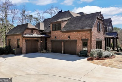 Nestled on a private .88-acre wooded lot in the prestigious on The River Club in Georgia - for sale on GolfHomes.com, golf home, golf lot