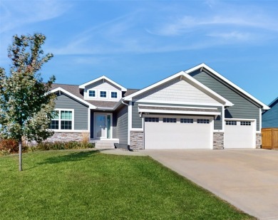 This coastal-inspired ranch home in Warrior Run Estates offers on Countryside Golf Course in Iowa - for sale on GolfHomes.com, golf home, golf lot