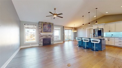 This coastal-inspired ranch home in Warrior Run Estates offers on Countryside Golf Course in Iowa - for sale on GolfHomes.com, golf home, golf lot