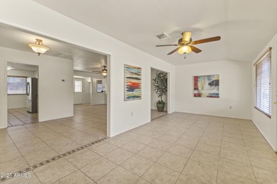 Welcome to this SPACIOUS 3-bedroom, 2-bath, 2-car garage home in on Sun City Lakes West and East in Arizona - for sale on GolfHomes.com, golf home, golf lot