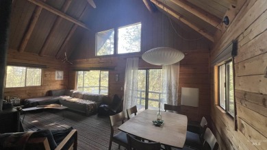 A cozy little log cabin. Two bedrooms, one is in the large open on Terrace Lakes Golf Resort in Idaho - for sale on GolfHomes.com, golf home, golf lot