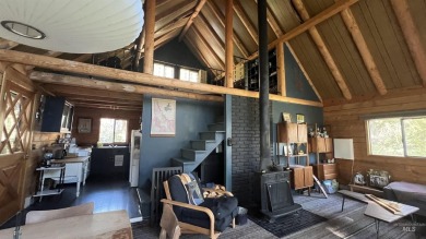 A cozy little log cabin. Two bedrooms, one is in the large open on Terrace Lakes Golf Resort in Idaho - for sale on GolfHomes.com, golf home, golf lot