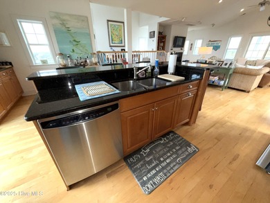 Discover the perfect blend of coastal elegance and resort-style on The Currituck Golf Club in North Carolina - for sale on GolfHomes.com, golf home, golf lot