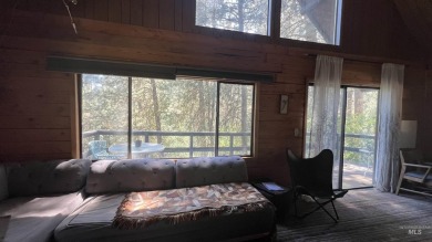 A cozy little log cabin. Two bedrooms, one is in the large open on Terrace Lakes Golf Resort in Idaho - for sale on GolfHomes.com, golf home, golf lot