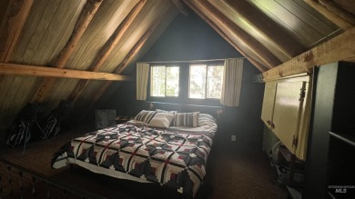 A cozy little log cabin. Two bedrooms, one is in the large open on Terrace Lakes Golf Resort in Idaho - for sale on GolfHomes.com, golf home, golf lot