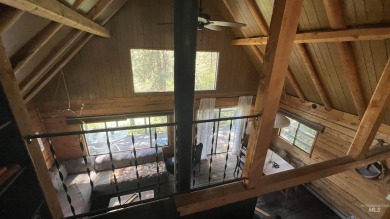A cozy little log cabin. Two bedrooms, one is in the large open on Terrace Lakes Golf Resort in Idaho - for sale on GolfHomes.com, golf home, golf lot