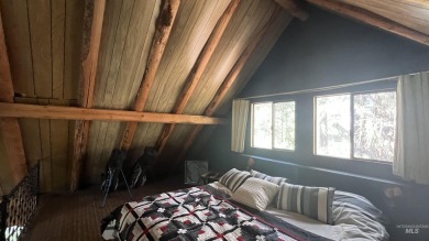 A cozy little log cabin. Two bedrooms, one is in the large open on Terrace Lakes Golf Resort in Idaho - for sale on GolfHomes.com, golf home, golf lot