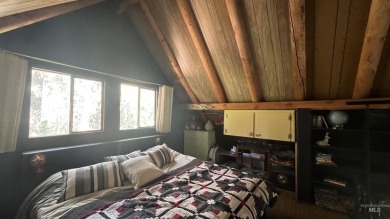 A cozy little log cabin. Two bedrooms, one is in the large open on Terrace Lakes Golf Resort in Idaho - for sale on GolfHomes.com, golf home, golf lot