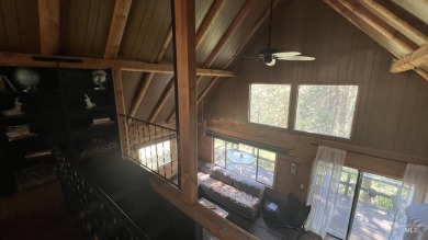 A cozy little log cabin. Two bedrooms, one is in the large open on Terrace Lakes Golf Resort in Idaho - for sale on GolfHomes.com, golf home, golf lot