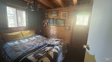 A cozy little log cabin. Two bedrooms, one is in the large open on Terrace Lakes Golf Resort in Idaho - for sale on GolfHomes.com, golf home, golf lot