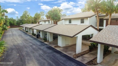 55+ FIRST FLOOR UNIT Come enjoy Escondido, the epitome of the on Tomoka Oaks Golf and Country Club in Florida - for sale on GolfHomes.com, golf home, golf lot