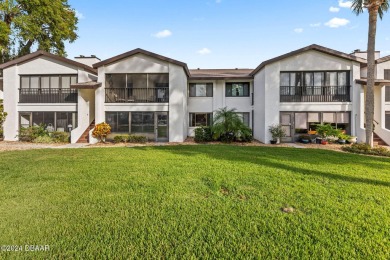 55+ FIRST FLOOR UNIT Come enjoy Escondido, the epitome of the on Tomoka Oaks Golf and Country Club in Florida - for sale on GolfHomes.com, golf home, golf lot