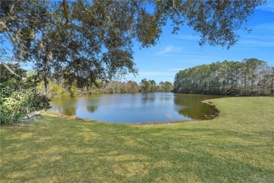 Meticulously maintained, this Hamilton Jefferson model is in on Okatie Creek Golf Club in South Carolina - for sale on GolfHomes.com, golf home, golf lot