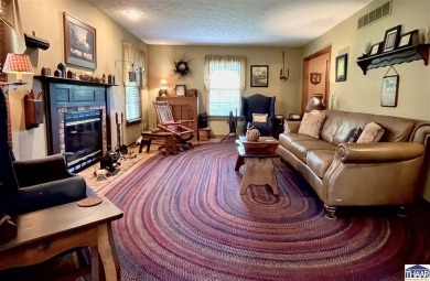 This Beautiful Salt Block 3-4 bedroom, 2.5 bath home in a on Hulman Links Golf Course in Indiana - for sale on GolfHomes.com, golf home, golf lot