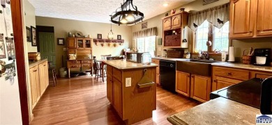 This Beautiful Salt Block 3-4 bedroom, 2.5 bath home in a on Hulman Links Golf Course in Indiana - for sale on GolfHomes.com, golf home, golf lot