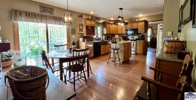 This Beautiful Salt Block 3-4 bedroom, 2.5 bath home in a on Hulman Links Golf Course in Indiana - for sale on GolfHomes.com, golf home, golf lot