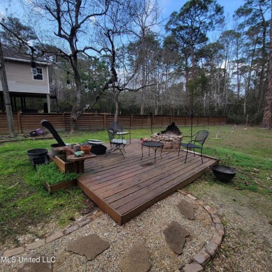 Discover this 3-bedroom, 2-bathroom home nestled right on the on Pass Christian Isles Golf Club in Mississippi - for sale on GolfHomes.com, golf home, golf lot