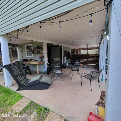 Discover this 3-bedroom, 2-bathroom home nestled right on the on Pass Christian Isles Golf Club in Mississippi - for sale on GolfHomes.com, golf home, golf lot