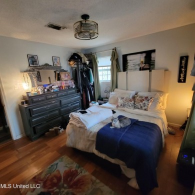 Discover this 3-bedroom, 2-bathroom home nestled right on the on Pass Christian Isles Golf Club in Mississippi - for sale on GolfHomes.com, golf home, golf lot