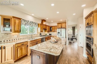 Experience the epitome of Colorado living with this stunning on Kings Deer Golf Club in Colorado - for sale on GolfHomes.com, golf home, golf lot