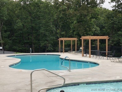 Recently remodeled and perfectly designed for your weekend on Seasons Ridge At Four Seasons in Missouri - for sale on GolfHomes.com, golf home, golf lot