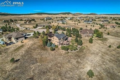 Experience the epitome of Colorado living with this stunning on Kings Deer Golf Club in Colorado - for sale on GolfHomes.com, golf home, golf lot