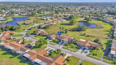 WATER/GOLF COURSE VIEWS!! OVERSIZED LANAI  NEW WINDOWS! Step on The Glades Golf and Country Club in Florida - for sale on GolfHomes.com, golf home, golf lot