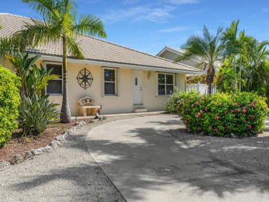 Paradise awaits! Welcome to your 3 bedroom 2 bath dream home in on Key Colony Beach Golf Course in Florida - for sale on GolfHomes.com, golf home, golf lot