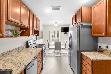 First Floor Unit - Priced to Sell! Enjoy a screened porch with on Hunters Run Golf and Country Club in Florida - for sale on GolfHomes.com, golf home, golf lot