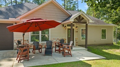 Get ready to fall in love with this charming 3-bed, 2-bath, 1 on Rayburn Country Club in Texas - for sale on GolfHomes.com, golf home, golf lot