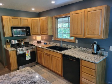 Adorable 2 bed/2 bath home south of Lake Leann with Lake access on Lake LeAnn Golf Course in Michigan - for sale on GolfHomes.com, golf home, golf lot