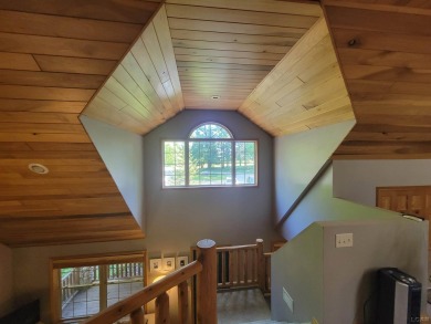 Adorable 2 bed/2 bath home south of Lake Leann with Lake access on Lake LeAnn Golf Course in Michigan - for sale on GolfHomes.com, golf home, golf lot