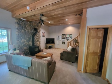 Adorable 2 bed/2 bath home south of Lake Leann with Lake access on Lake LeAnn Golf Course in Michigan - for sale on GolfHomes.com, golf home, golf lot