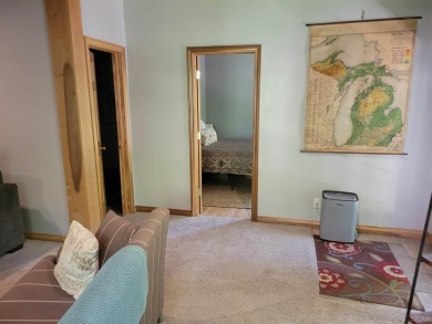 Adorable 2 bed/2 bath home south of Lake Leann with Lake access on Lake LeAnn Golf Course in Michigan - for sale on GolfHomes.com, golf home, golf lot