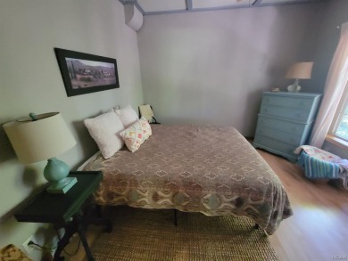 Adorable 2 bed/2 bath home south of Lake Leann with Lake access on Lake LeAnn Golf Course in Michigan - for sale on GolfHomes.com, golf home, golf lot