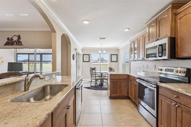 One-owner 2017 home backing to the 2nd fairway of the Arlington on Arlington Ridge Golf Club in Florida - for sale on GolfHomes.com, golf home, golf lot