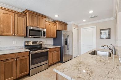 One-owner 2017 home backing to the 2nd fairway of the Arlington on Arlington Ridge Golf Club in Florida - for sale on GolfHomes.com, golf home, golf lot