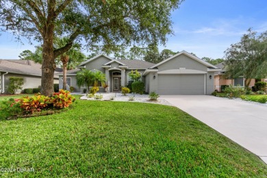 Gorgeous pool home nestled on a quiet street in the highly on Plantation Bay Golf and Country Club in Florida - for sale on GolfHomes.com, golf home, golf lot