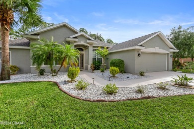 Gorgeous pool home nestled on a quiet street in the highly on Plantation Bay Golf and Country Club in Florida - for sale on GolfHomes.com, golf home, golf lot