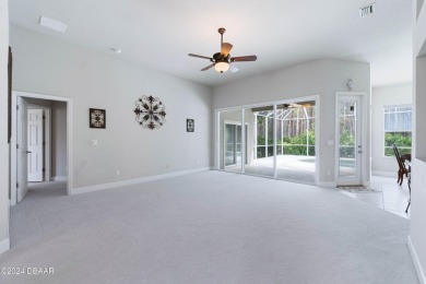 Gorgeous pool home nestled on a quiet street in the highly on Plantation Bay Golf and Country Club in Florida - for sale on GolfHomes.com, golf home, golf lot