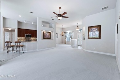 Gorgeous pool home nestled on a quiet street in the highly on Plantation Bay Golf and Country Club in Florida - for sale on GolfHomes.com, golf home, golf lot