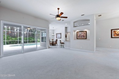 Gorgeous pool home nestled on a quiet street in the highly on Plantation Bay Golf and Country Club in Florida - for sale on GolfHomes.com, golf home, golf lot