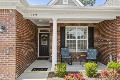 Welcome to this stunning end unit townhome in the Magnolia on Magnolia Greens Golf Plantation in North Carolina - for sale on GolfHomes.com, golf home, golf lot